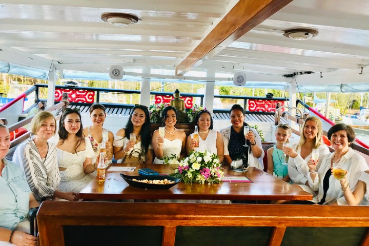 a group of people sitting at a table